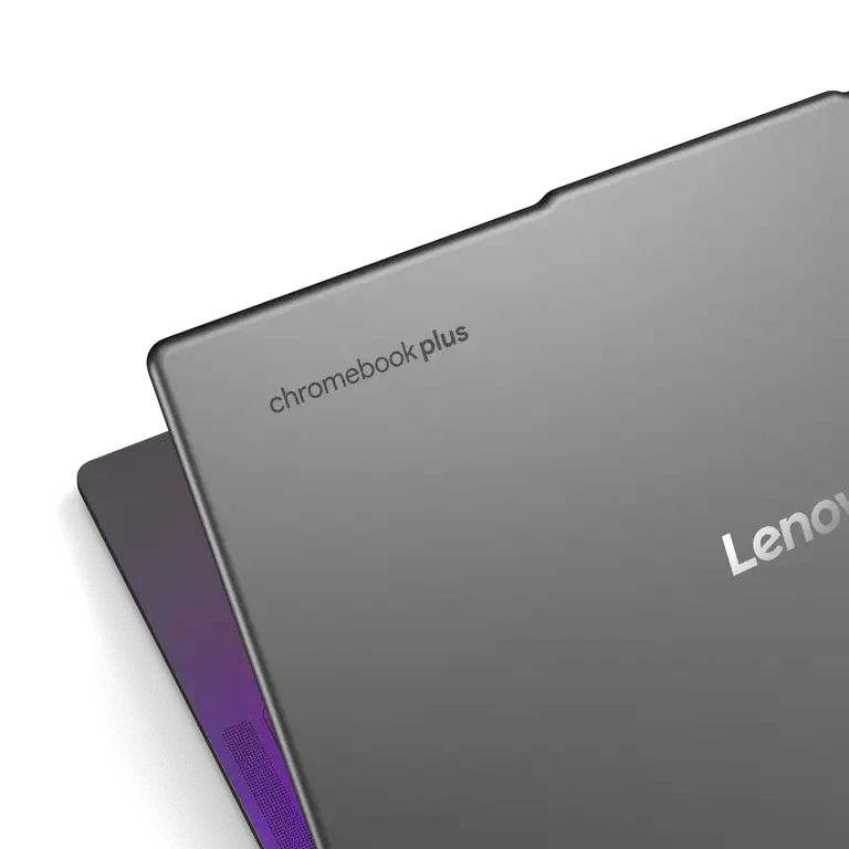 Open Lenovo Chromebook Plus device with background wallpaper and app shelf visible.
